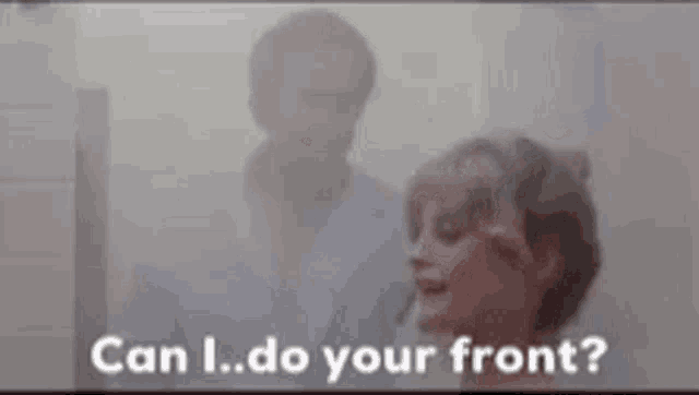 a man and a woman are standing in a bathroom and the woman is asking the man if he can do her front .