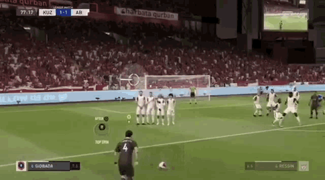 a soccer game is being played in a stadium and the score is 1-1