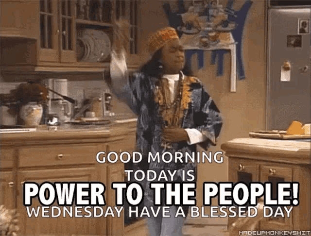 a woman is dancing in a kitchen with the words good morning today is power to the people wednesday have a blessed day .