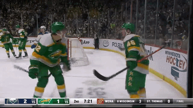 a hockey game is being played in minnesota and the score is 2 to 15