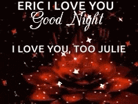 a stack of red candles with the words `` eric i love you i love you too julie and sweet dreams ''