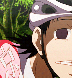 a close up of a person wearing a helmet and gloves