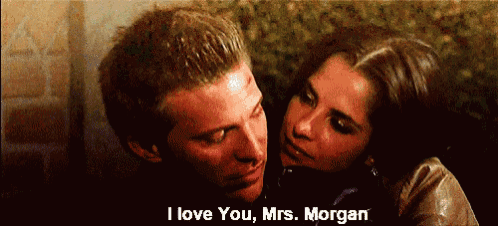 a man and a woman are hugging with the words i love you mrs. morgan below them