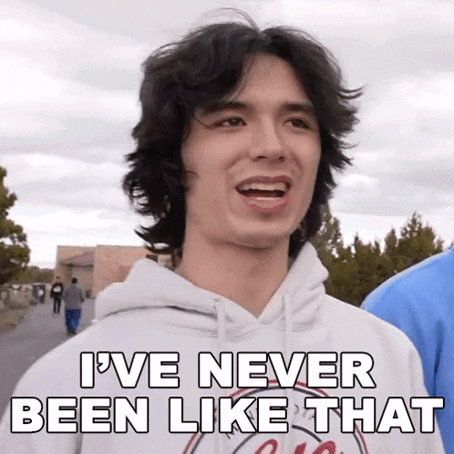 a young man in a white hoodie is saying i 've never been like that