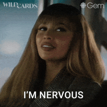 a woman says i 'm nervous in front of a wildcards logo