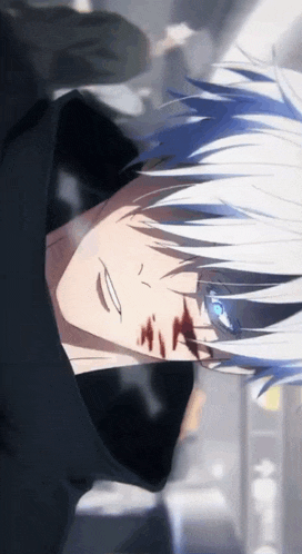a close up of a person 's face with blue eyes and blood on it .