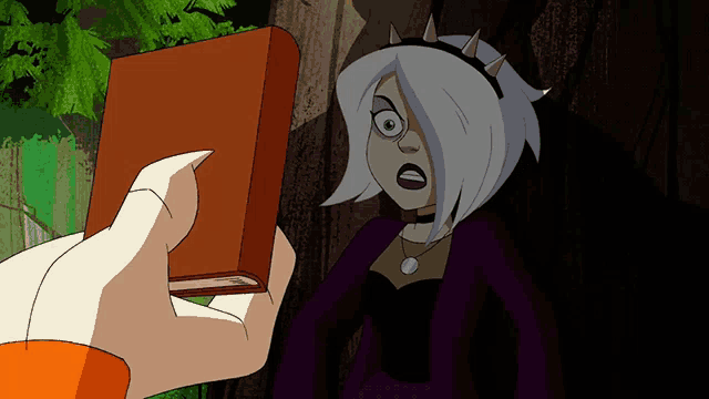 a cartoon character is holding a book in front of a tree