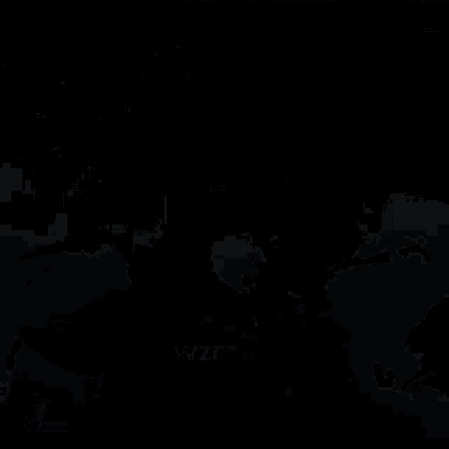 two men wearing masks are standing next to each other in front of a motorcycle with the word wzrse on it