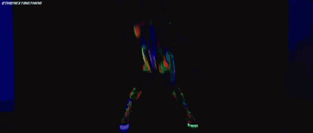 a woman in a neon outfit is dancing in a dark room .