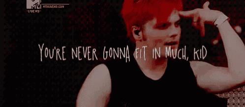 a man with red hair has the words " you 're never gonna fit in much kid " written on his forehead