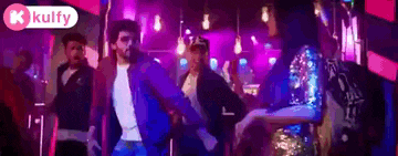 a group of people are dancing in a club with a kulfy logo in the corner