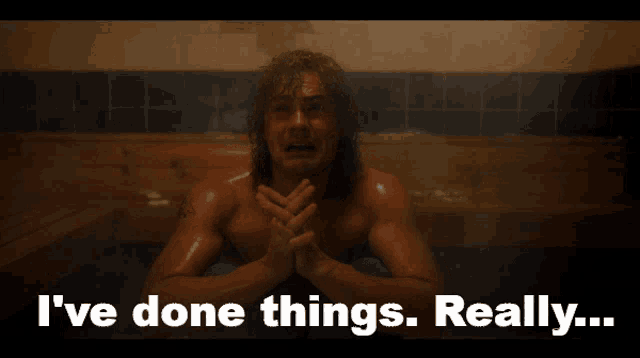 a man in a bathtub with the words i 've done things really on the bottom
