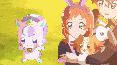 a girl with a unicorn headband is holding a dog