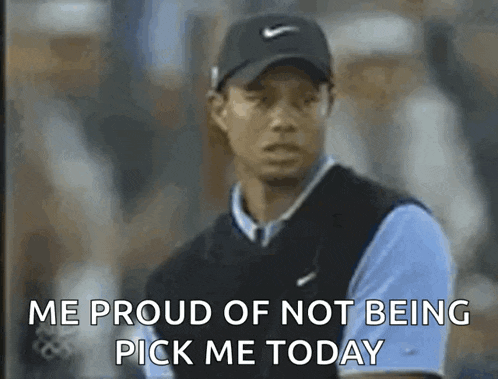 tiger woods is wearing a black hat and a blue shirt and says `` me proud of not being pick me today ''