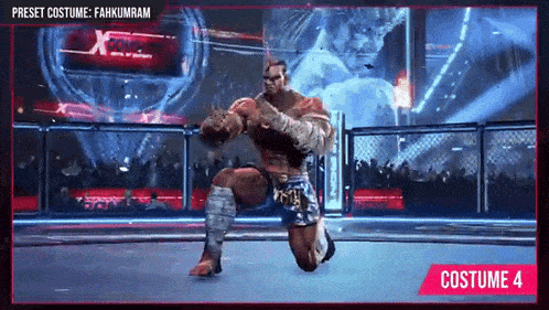 a man in a costume is kneeling down in a ring .