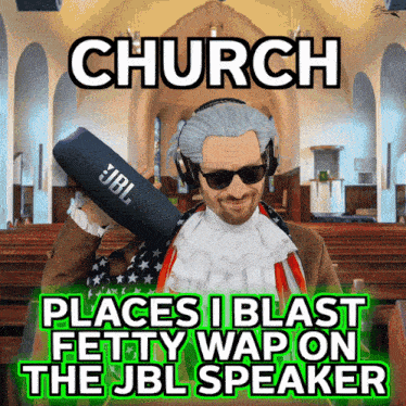 a man holding a jbl speaker in a church