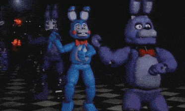 a bunch of stuffed animals are dancing in the dark