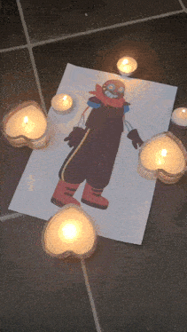 a drawing of error sans surrounded by candles
