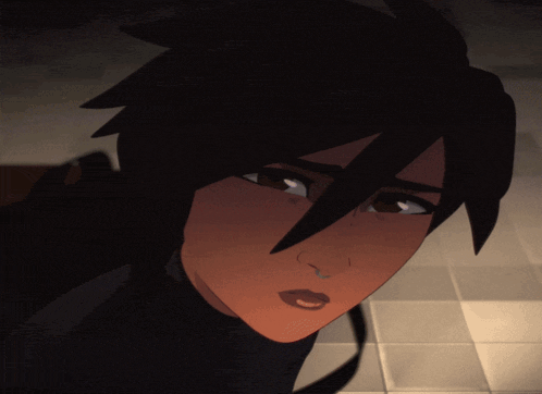 a close up of a woman 's face with a nose ring