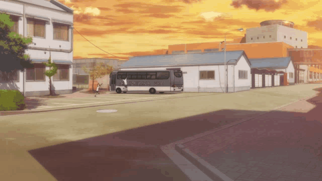 a bus is parked in front of a building with a sign that says ' tokyo metro ' on it