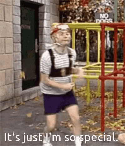 a man is running in front of a playground with the words " it 's just i 'm so special " below him