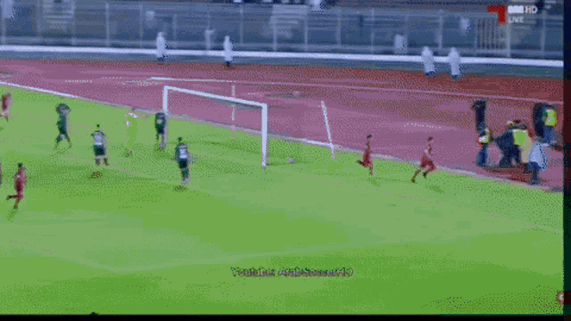 a man without a shirt is walking on a track with the words youtube arabsoccer hd at the bottom of the screen