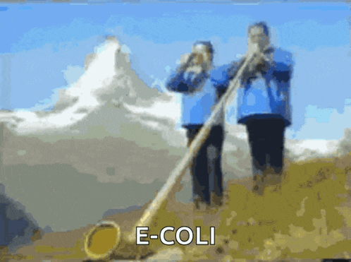 a couple of people playing a horn with the word e-coli in the corner