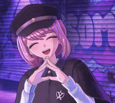 a girl with pink hair is making a heart with her hands in front of a purple wall