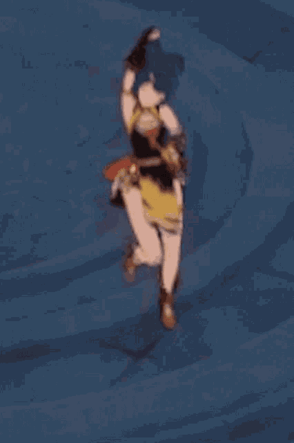 a cartoon character is jumping in the air on a blue surface .