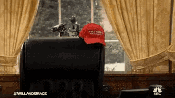 a red hat that says make america great again