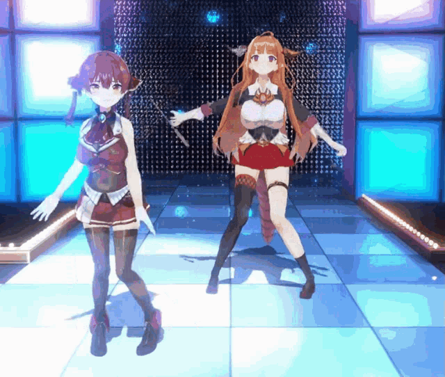 two anime characters are dancing on a stage