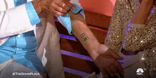 a man has a tattoo on his wrist that says ' i love you '