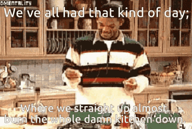 a man in a striped sweater is cooking in a kitchen