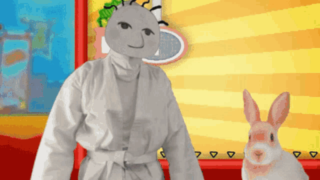 a cartoon character in a white robe stands next to a pink rabbit