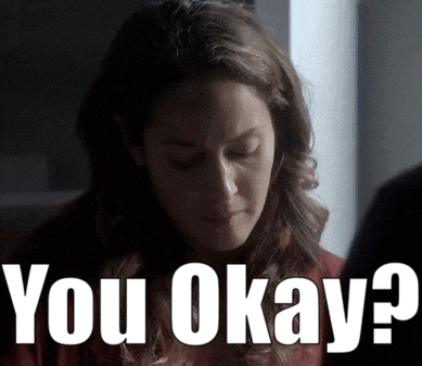 a woman with a sad look on her face and the words " you okay " below her