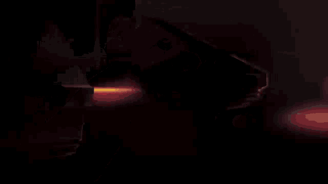 a cartoon drawing of a skull in a dark room