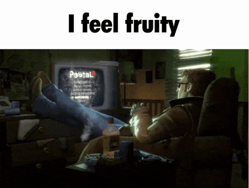 a man is sitting in front of a tv with his feet up and the words i feel fruity above him