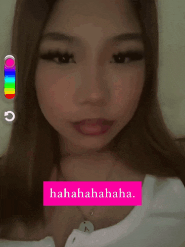 a close up of a woman 's face with pink hearts on her eyes and the words hahahaha