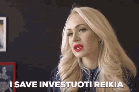 a woman with blonde hair and red lipstick says i save investuoti reikia .