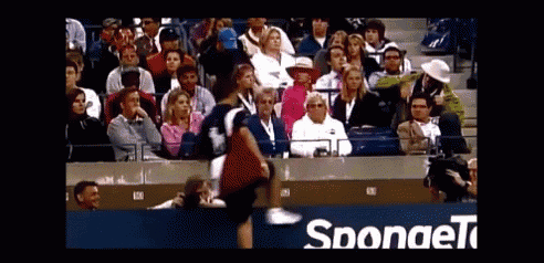 a crowd of people watching a tennis match with the word sponge on the bottom