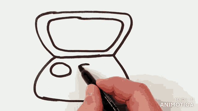 a person is drawing a makeup palette with a black marker