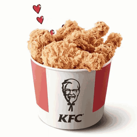 a bucket of fried chicken from kfc with hearts flying around it