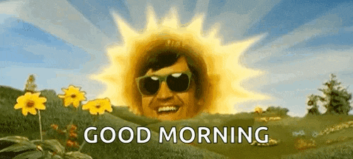 a man wearing sunglasses is standing in front of a sun with the words `` good morning '' .