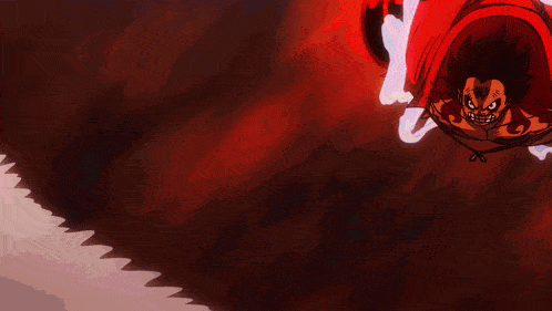 a person in a red shirt is holding a large sword in their hand .