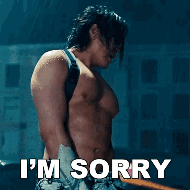 a shirtless man says i 'm sorry while holding a gun