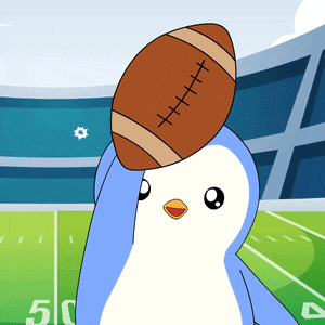 a cartoon penguin is holding a football in its beak