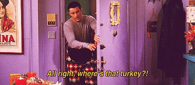 a man is standing in a doorway with the words all right where 's that turkey ?