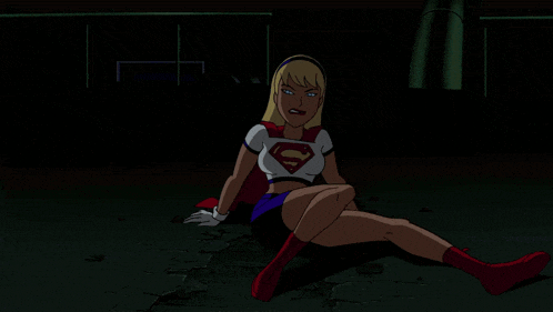 a woman in a superman costume throws a fist in the air