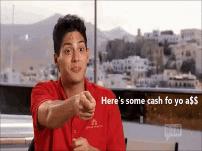 a man in a red shirt is pointing at the camera with the words here 's some cash fo yo a $ on the bottom