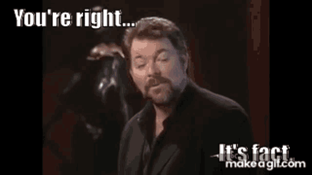 a man with a beard is standing in front of a black background and says you 're right .
